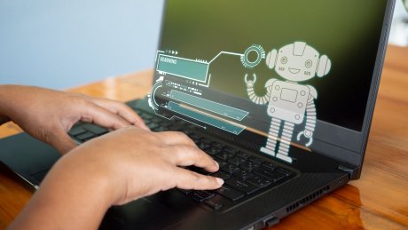 AI Robot op Laptop